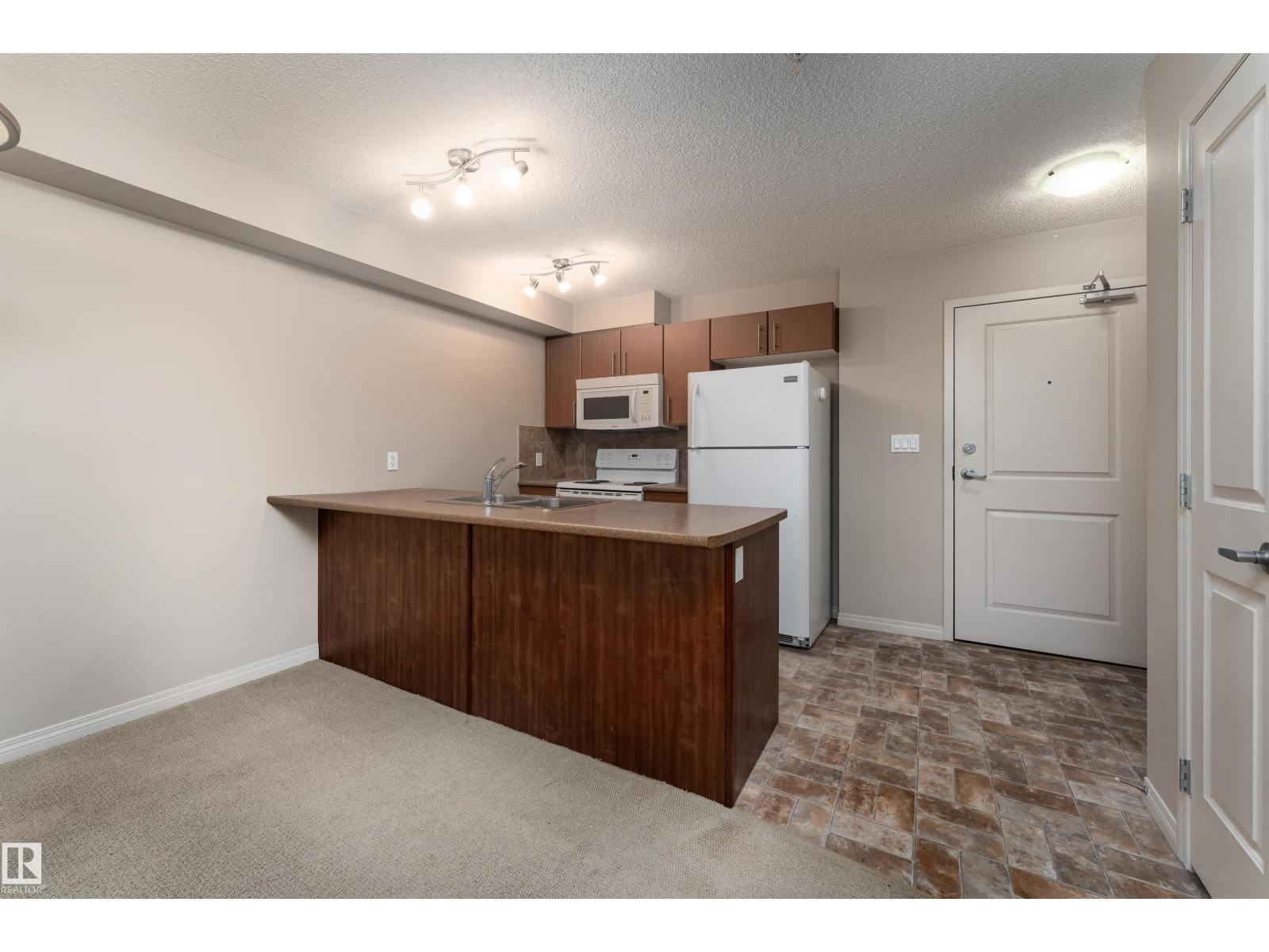 #202 105 AMBLESIDE DR SW