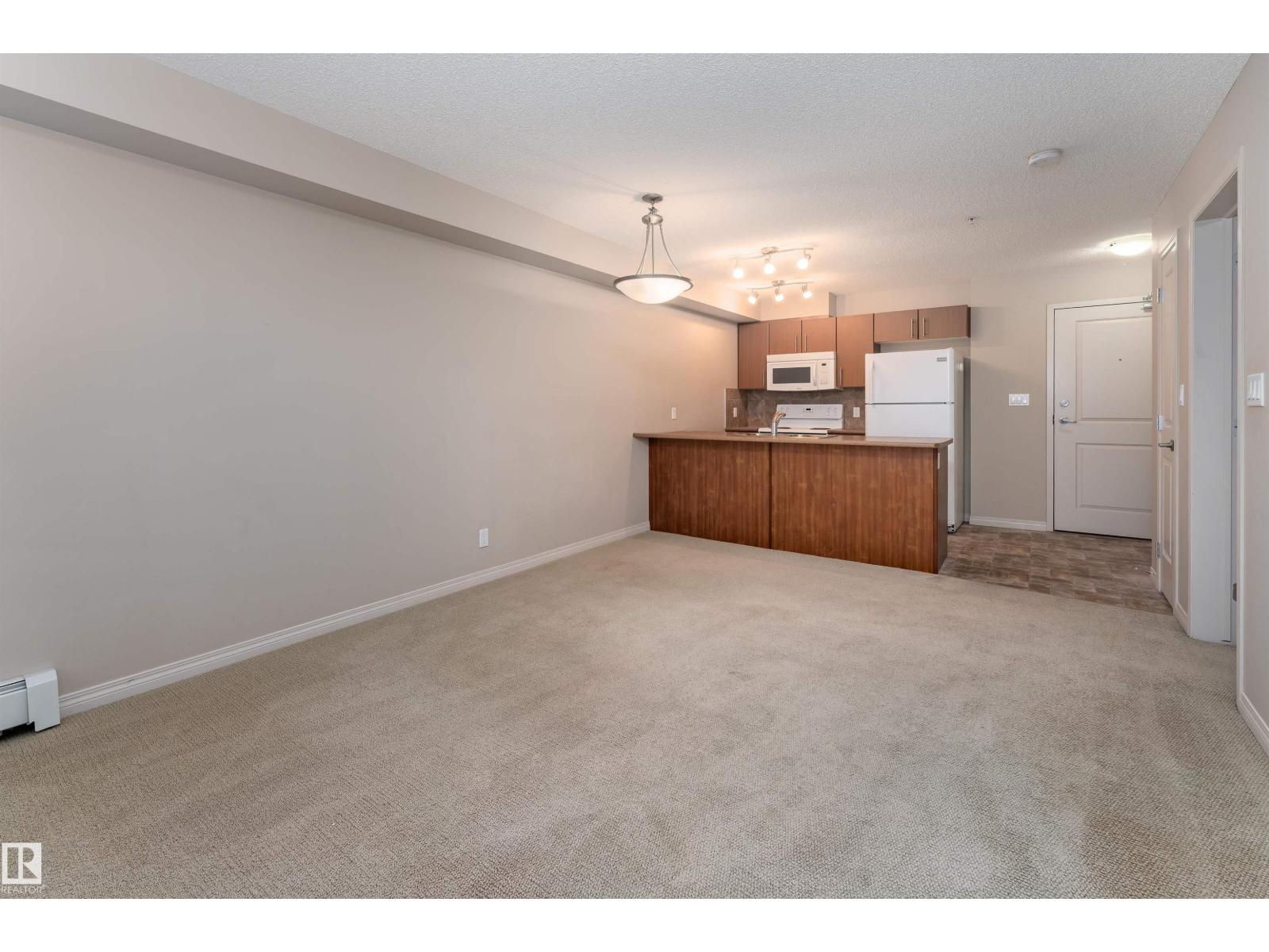 #202 105 AMBLESIDE DR SW