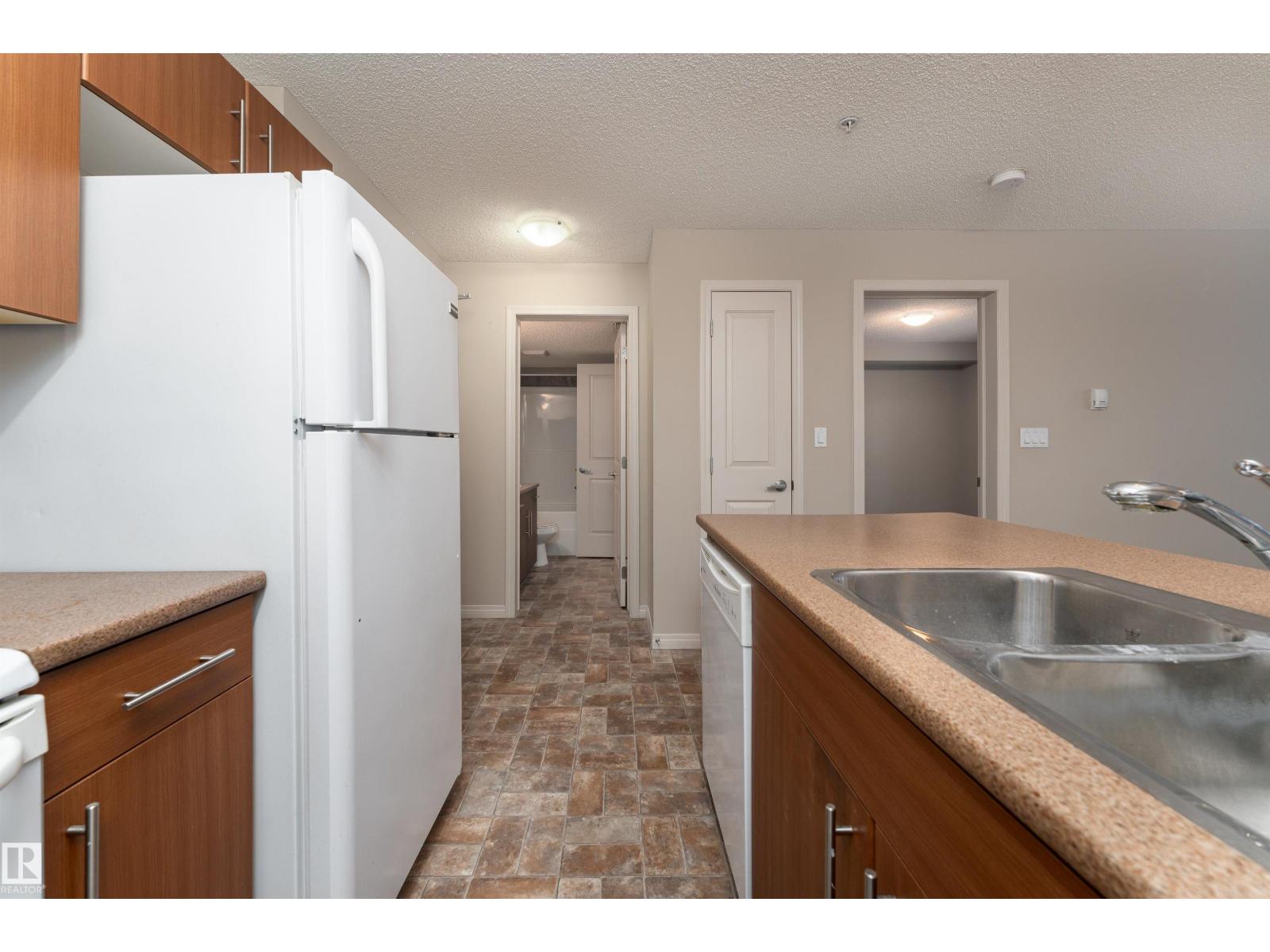 #202 105 AMBLESIDE DR SW