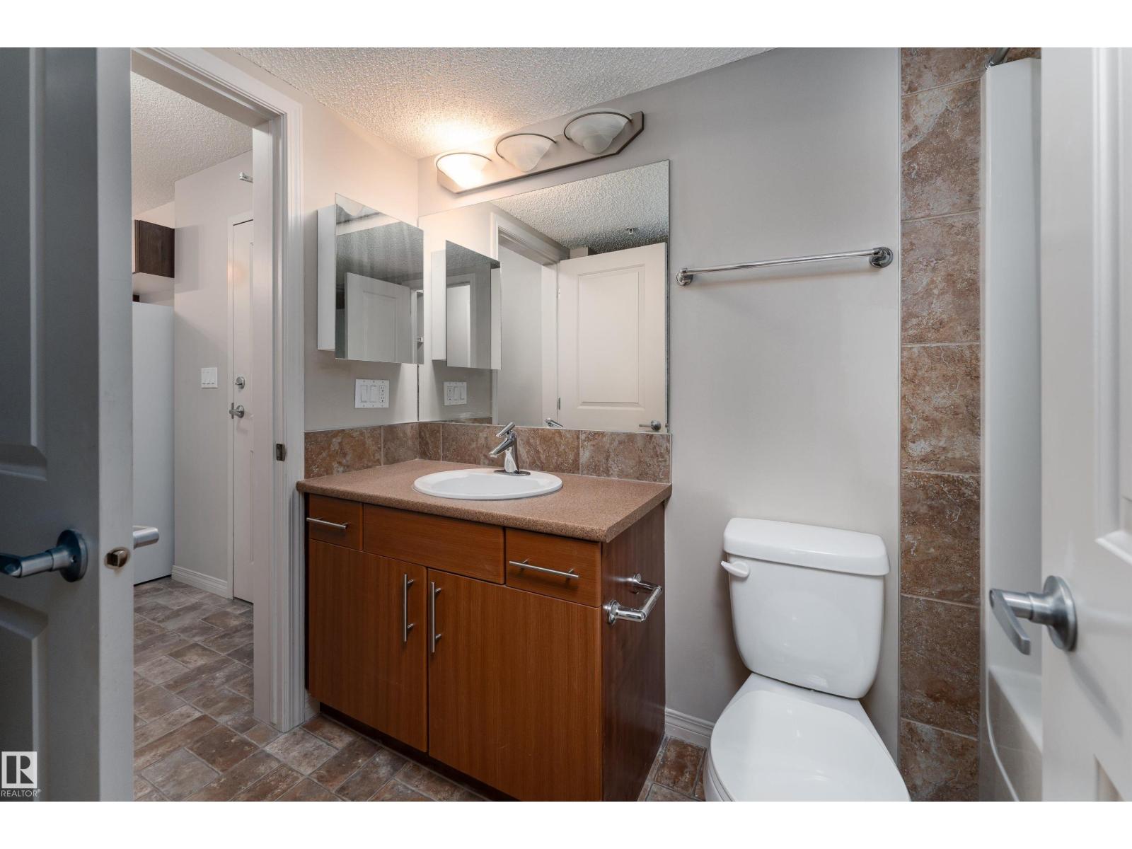 #202 105 AMBLESIDE DR SW