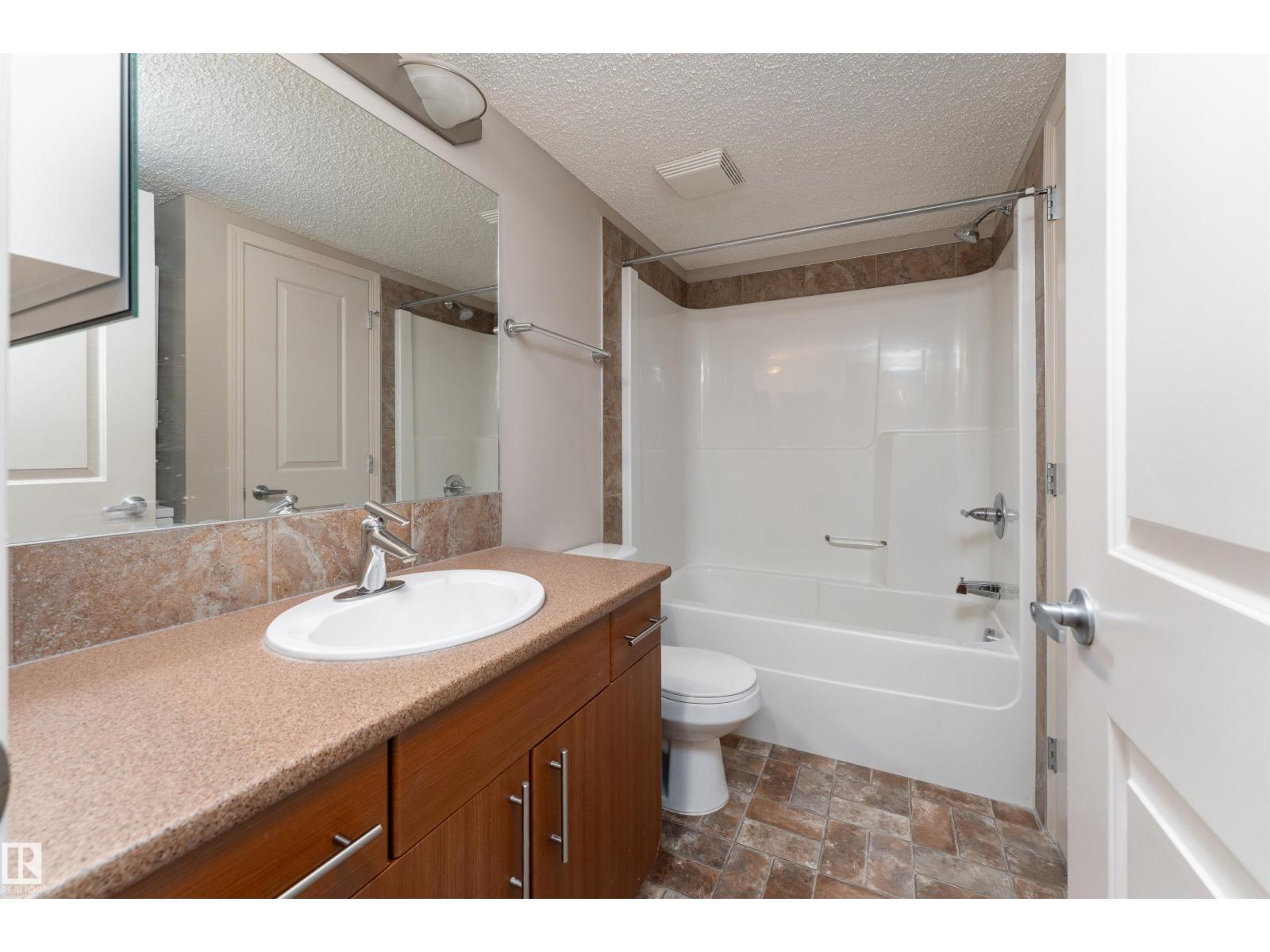 #202 105 AMBLESIDE DR SW