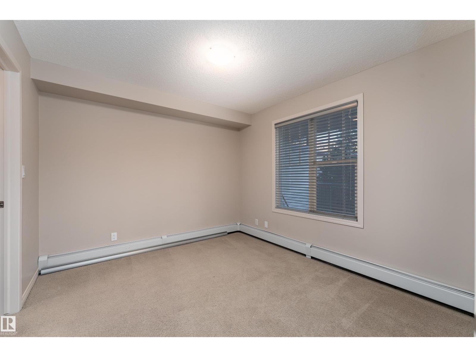 #202 105 AMBLESIDE DR SW