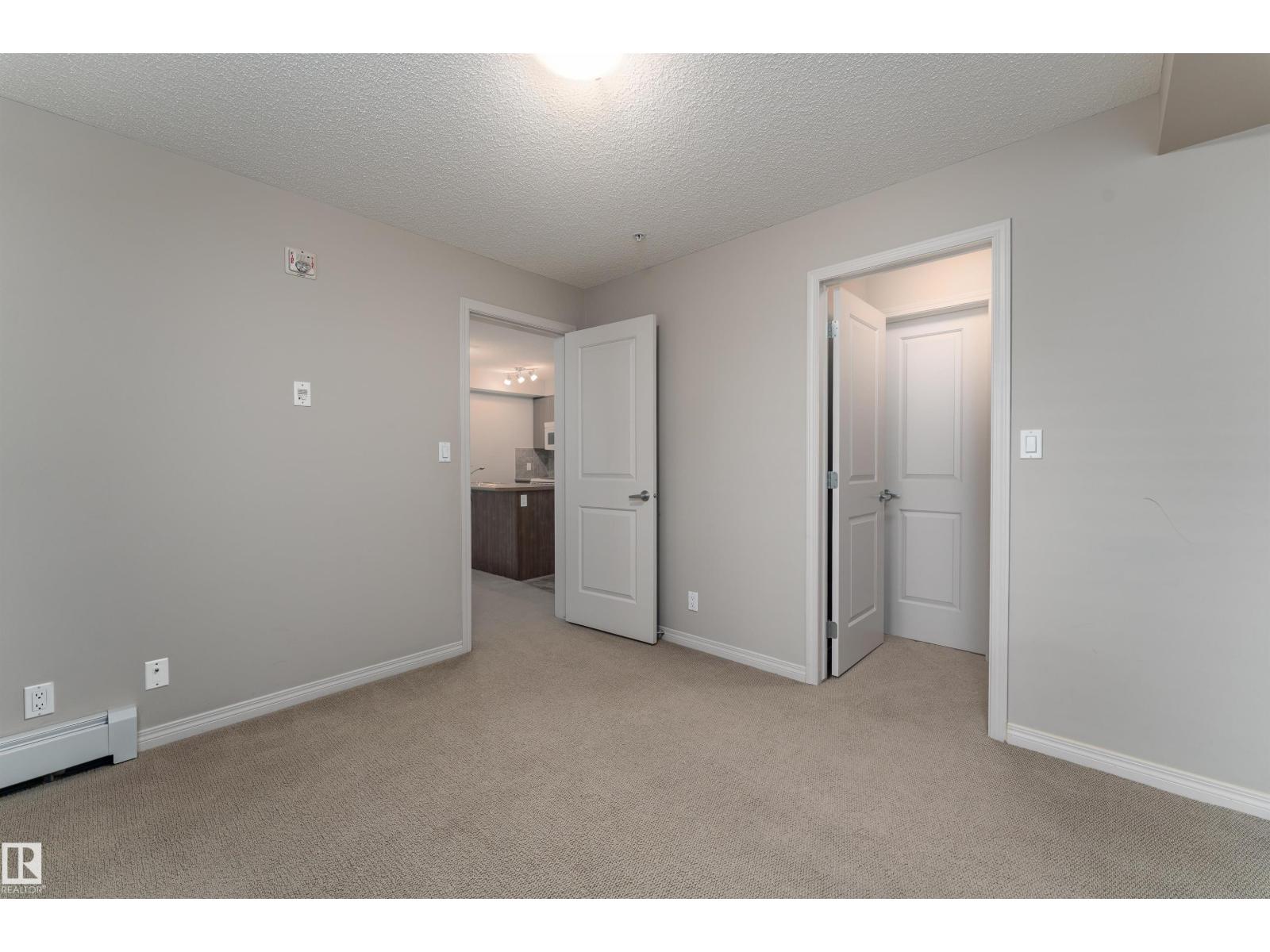 #202 105 AMBLESIDE DR SW