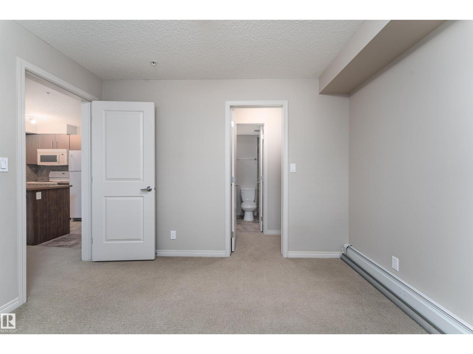 #202 105 AMBLESIDE DR SW