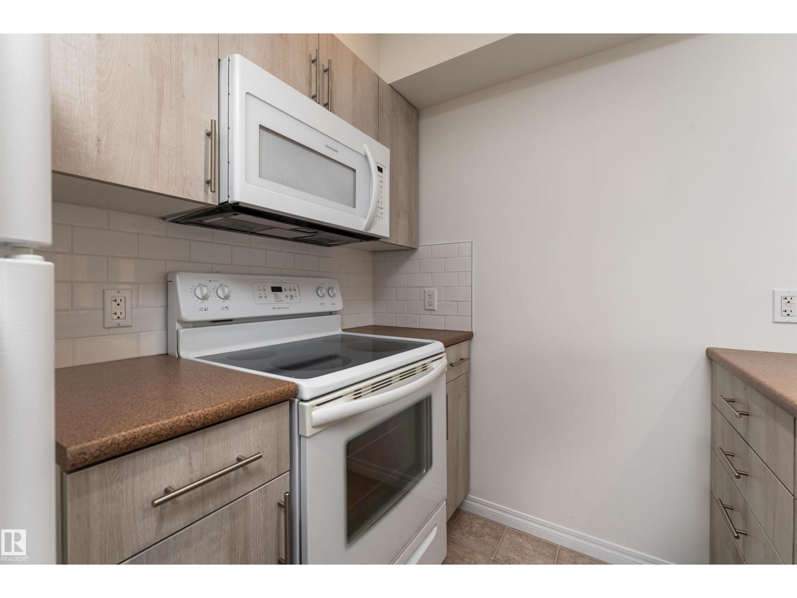 #303 105 AMBLESIDE DR SW