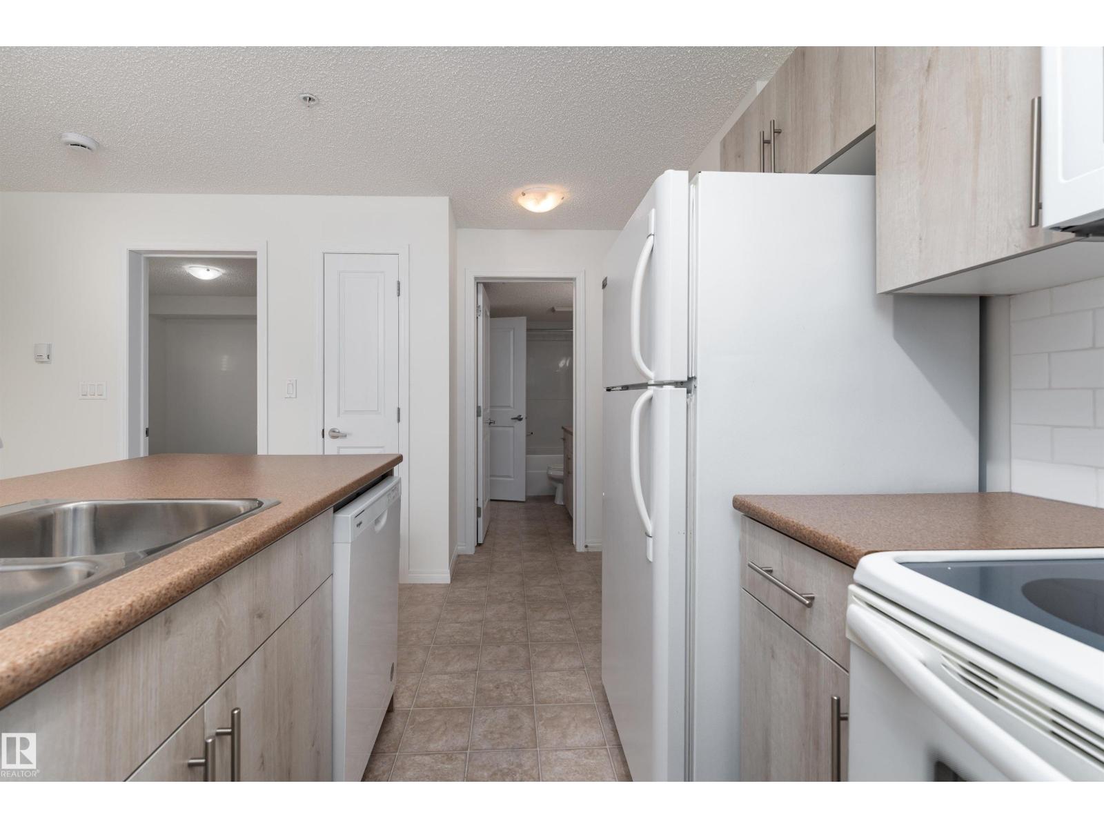 #303 105 AMBLESIDE DR SW