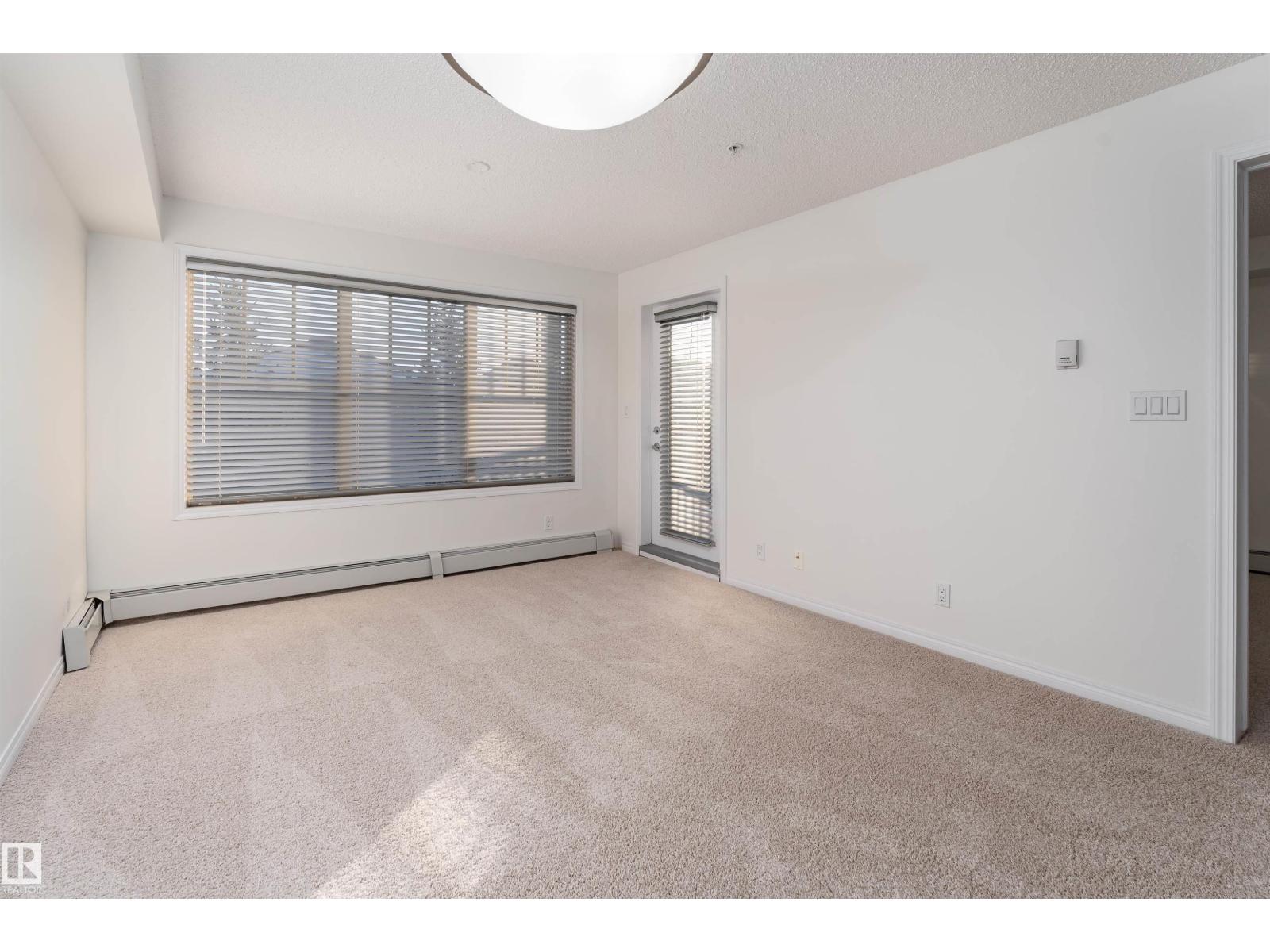 #303 105 AMBLESIDE DR SW