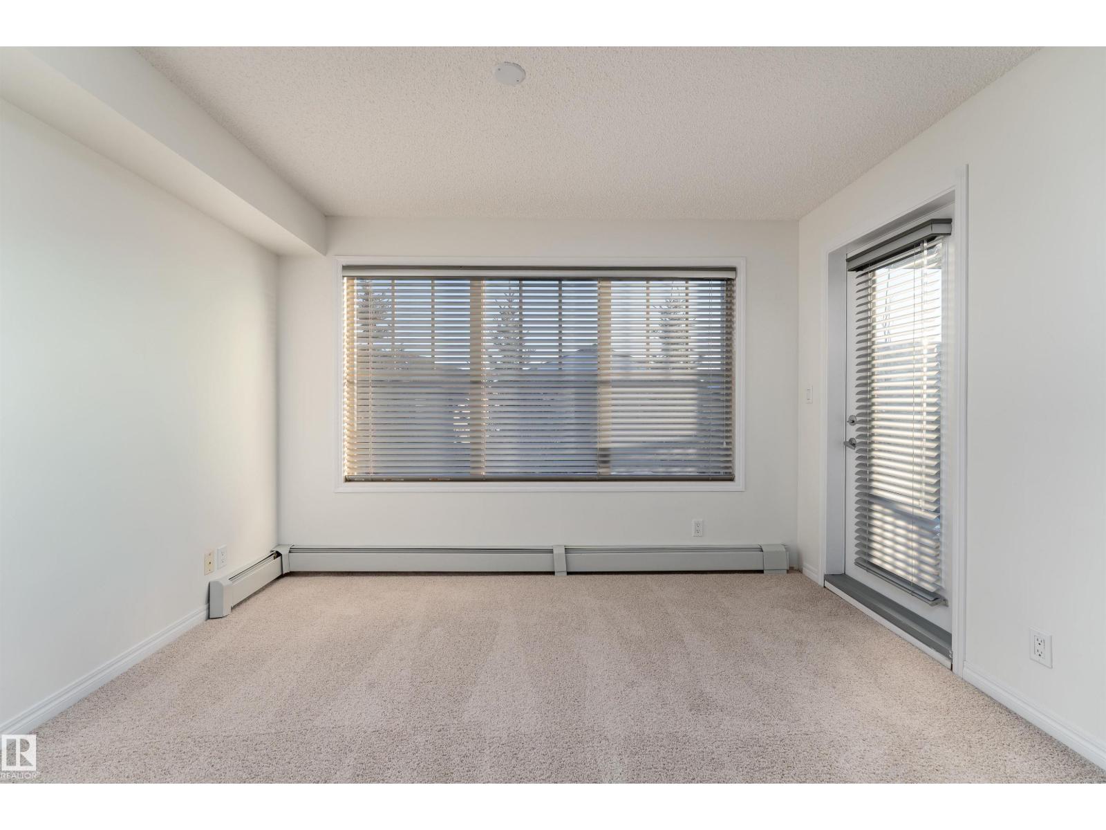 #303 105 AMBLESIDE DR SW