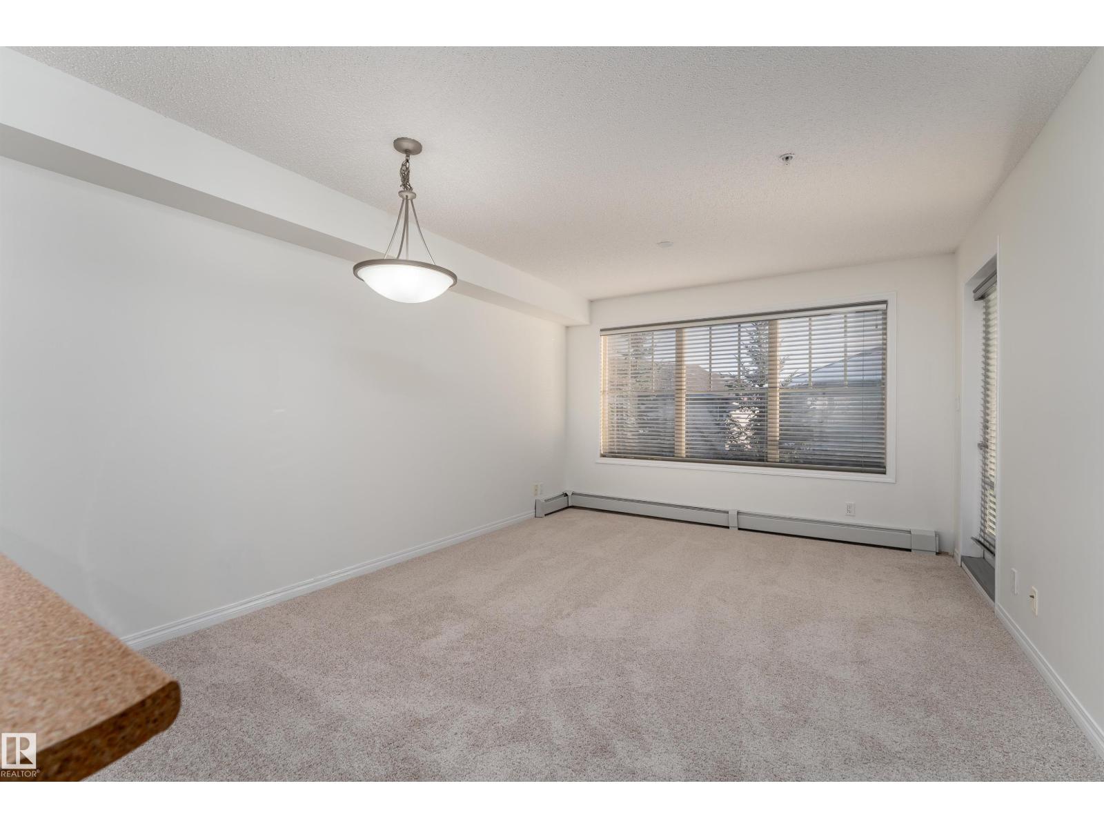 #303 105 AMBLESIDE DR SW