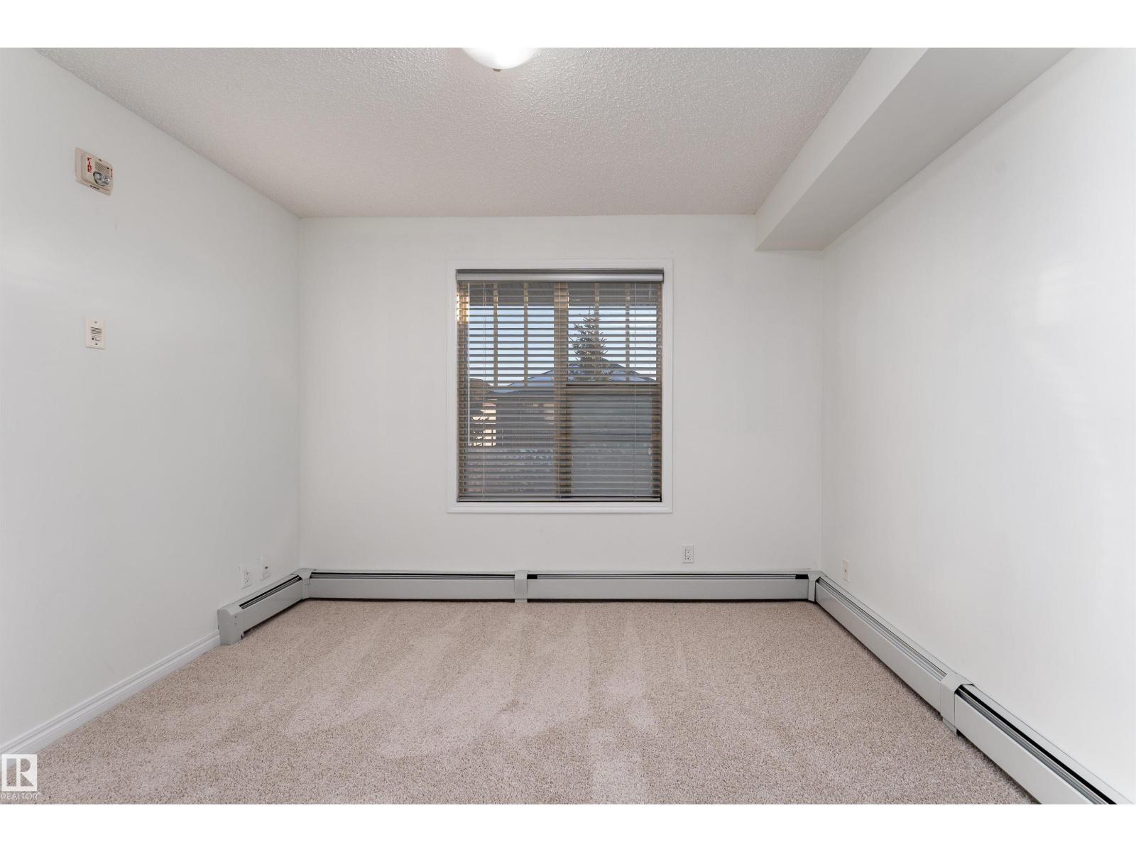 #303 105 AMBLESIDE DR SW