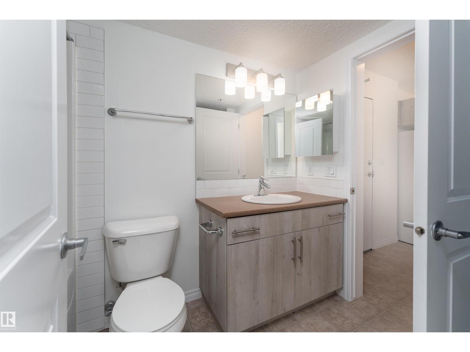 #303 105 AMBLESIDE DR SW
