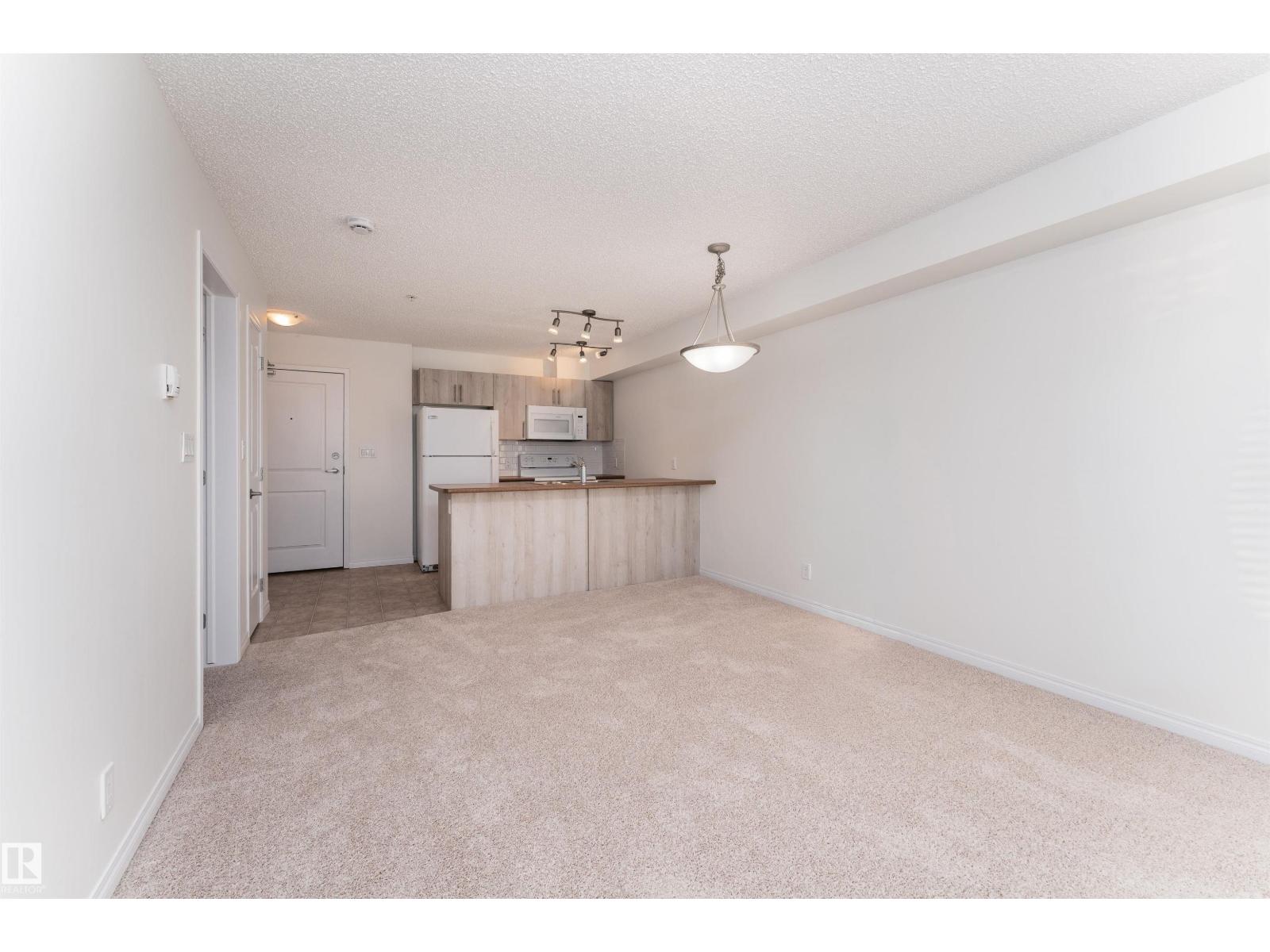 #303 105 AMBLESIDE DR SW