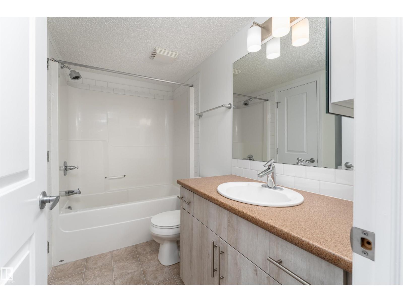 #303 105 AMBLESIDE DR SW