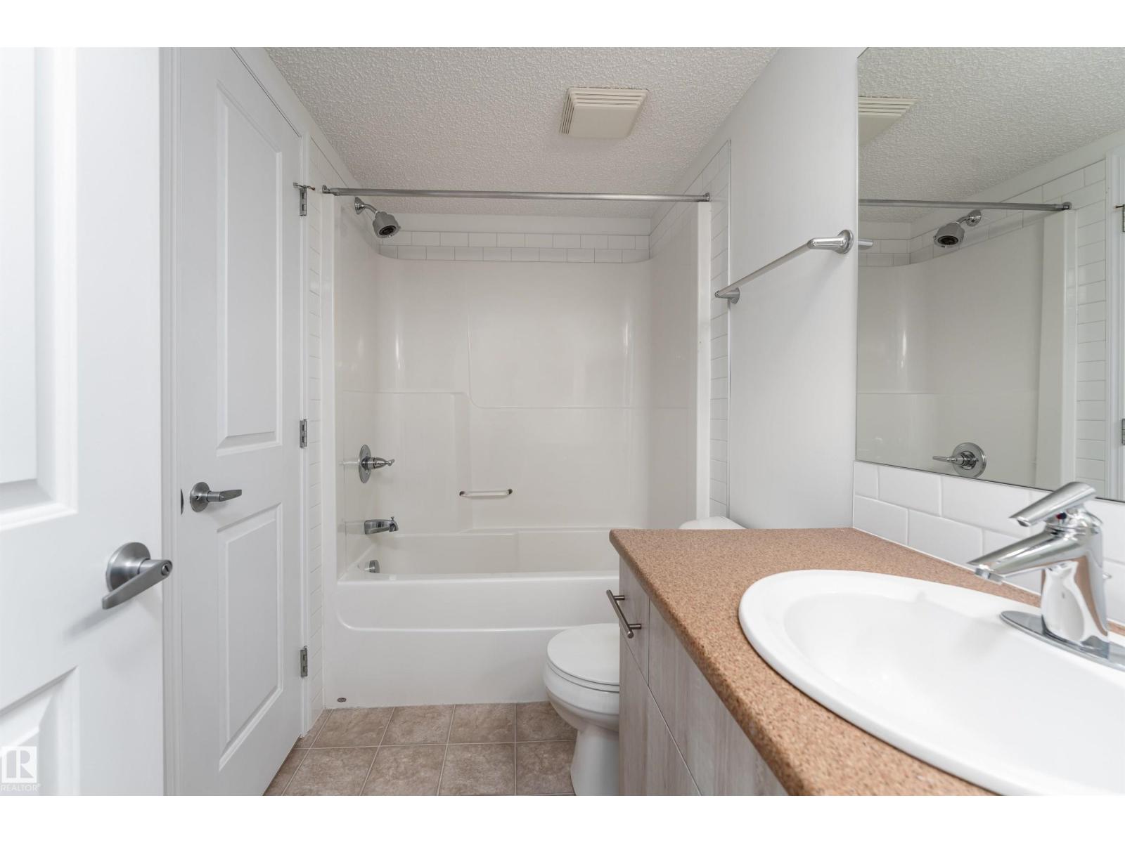 #303 105 AMBLESIDE DR SW
