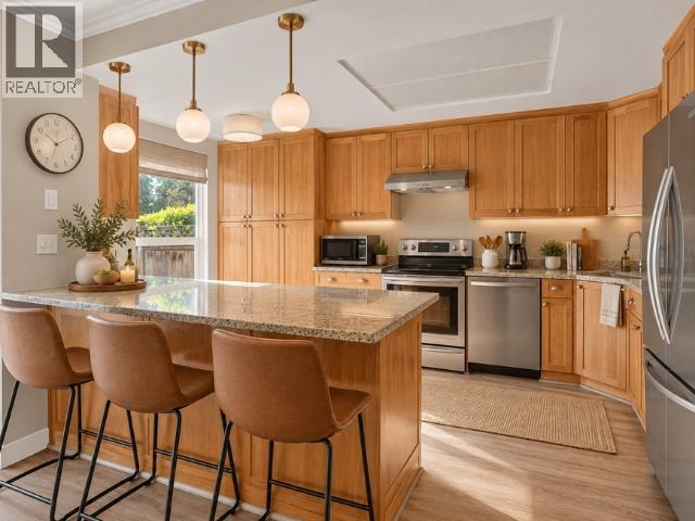 409 3980 Inlet Crescent, North Vancouver, British Columbia  V7G 2P9 - Photo 3 - R3175055