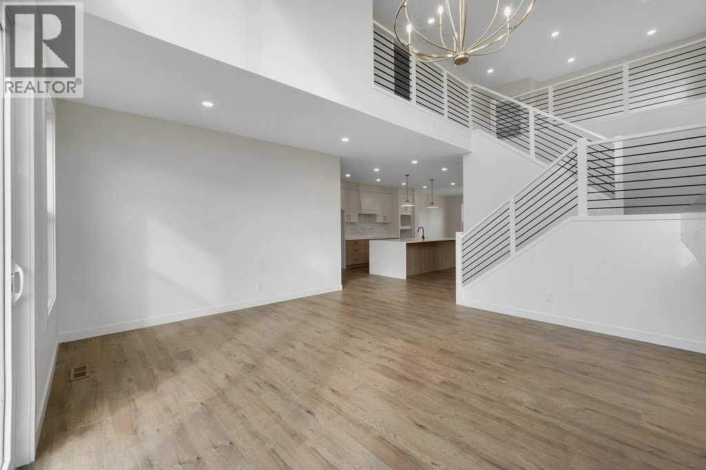 203 Harmony Circle, Rural Rocky View County, Alberta  T3Z 0H3 - Photo 12 - A2351651