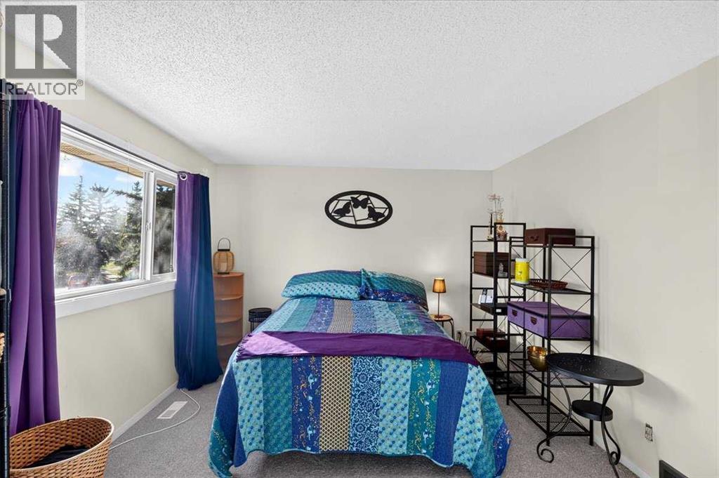 130 Woodmont Terrace SW, Calgary, Alberta  T2W 4Z4 - Photo 21 - A2351852