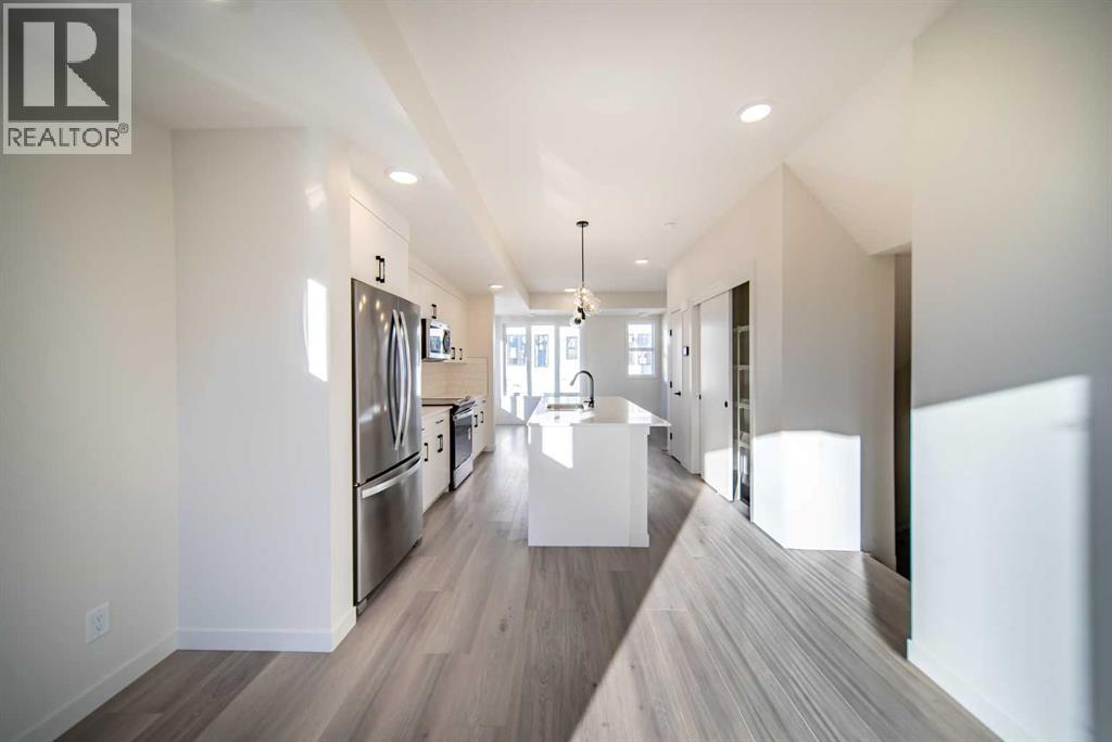 702a, 154 Arbour Lake Court Nw, Calgary, Alberta T3G 0H6 - Photo 5 - A2333310