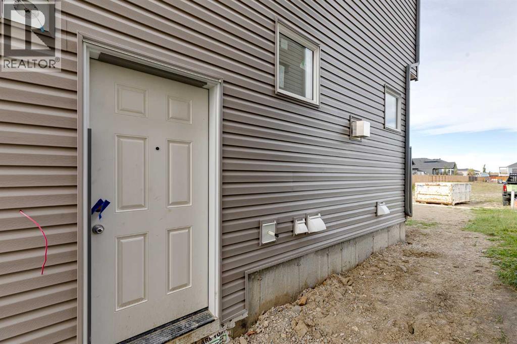 844 Hampshire Crescent Ne, High River, Alberta  T1V 0E4 - Photo 47 - A2349830