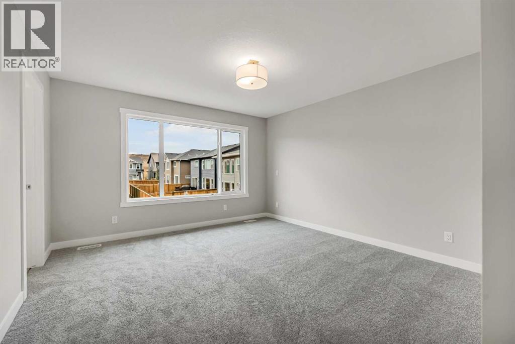 27 Creekside Rise Sw, Calgary, Alberta  T2X 5V9 - Photo 25 - A2338861
