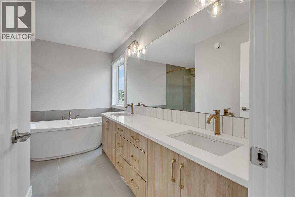 27 Creekside Rise Sw, Calgary, Alberta  T2X 5V9 - Photo 27 - A2338861