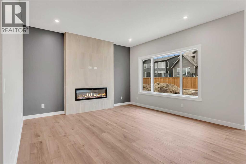 27 Creekside Rise Sw, Calgary, Alberta  T2X 5V9 - Photo 8 - A2338861