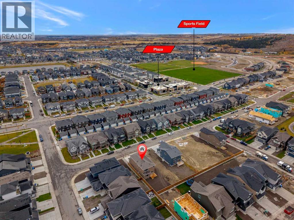27 Creekside Rise Sw, Calgary, Alberta  T2X 5V9 - Photo 46 - A2338861