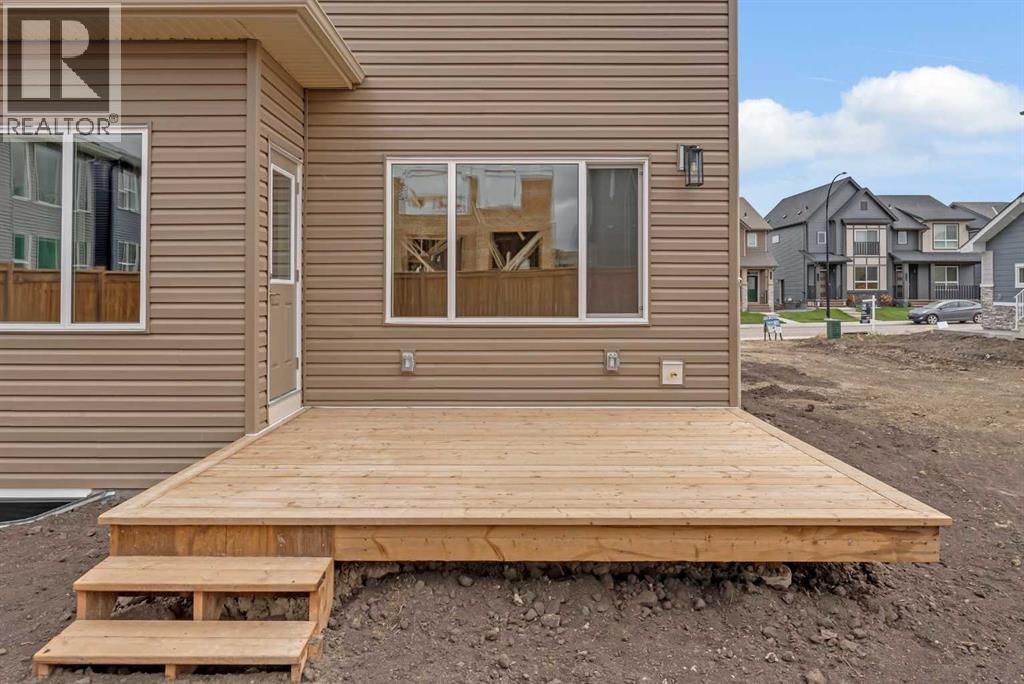27 Creekside Rise Sw, Calgary, Alberta  T2X 5V9 - Photo 39 - A2338861