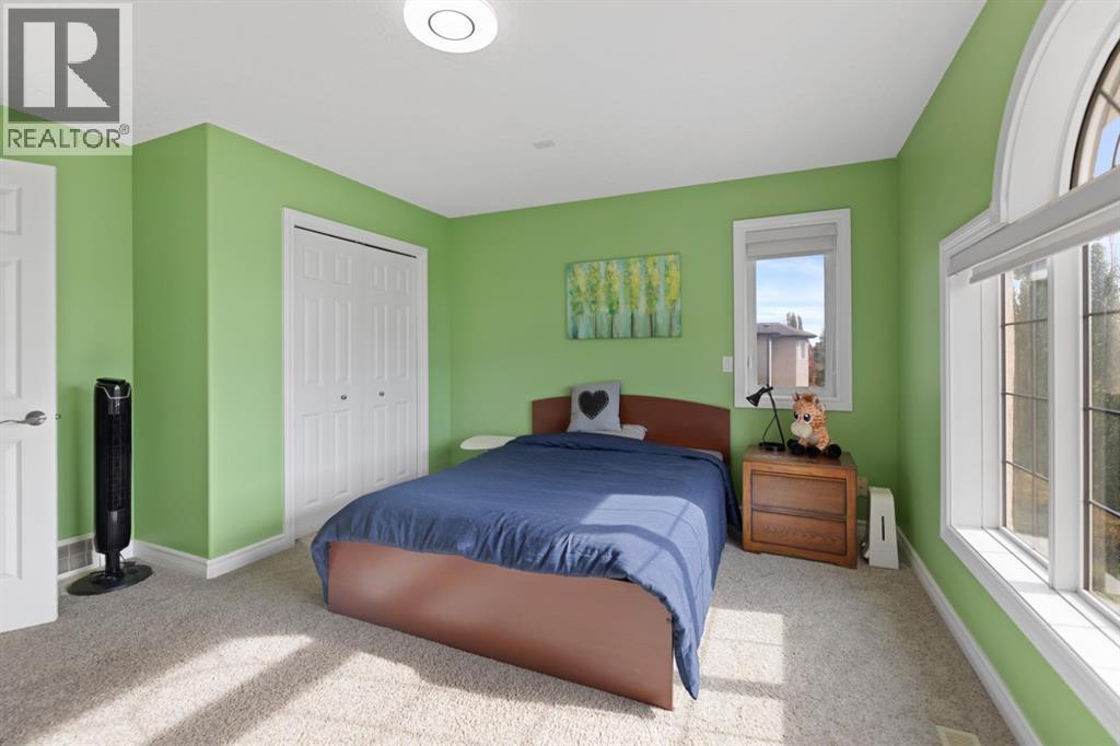 63 West Cedar Rise SW, Calgary, Alberta  T3H 5E2 - Photo 31 - A2351827