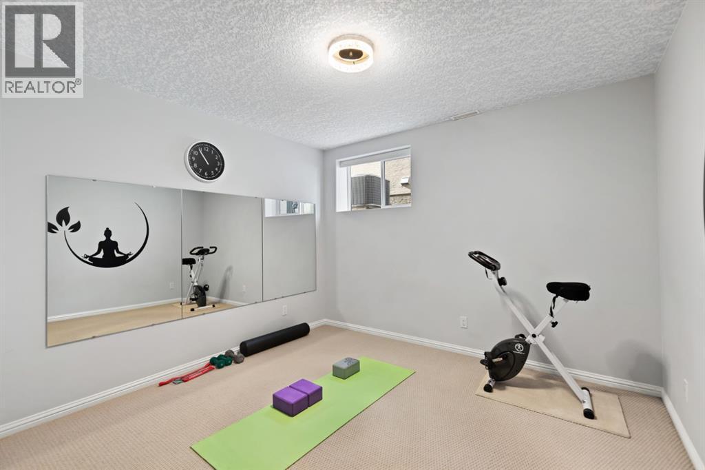 63 West Cedar Rise SW, Calgary, Alberta  T3H 5E2 - Photo 44 - A2351827