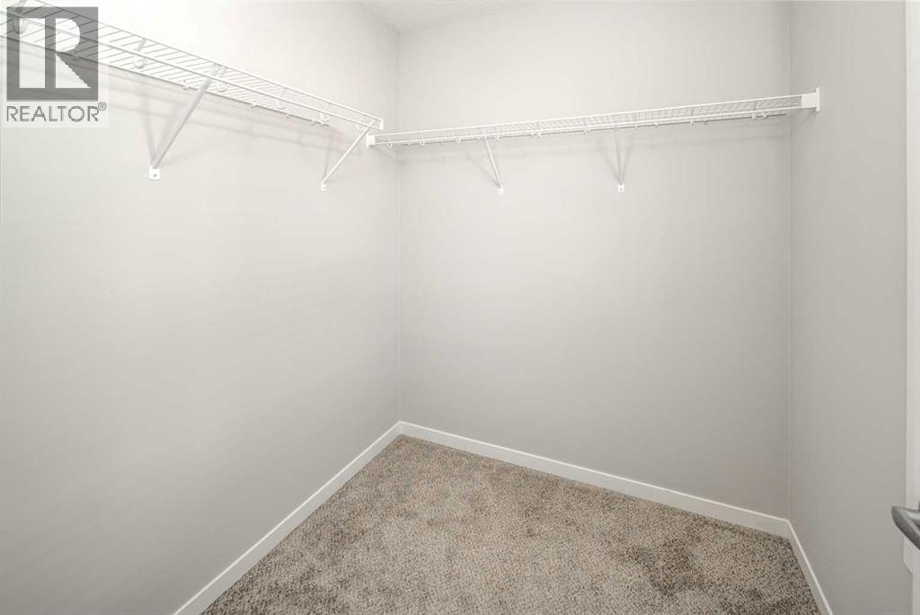 209 Harvest Hills Common Ne, Calgary, Alberta  T3K 2M7 - Photo 12 - A2351137