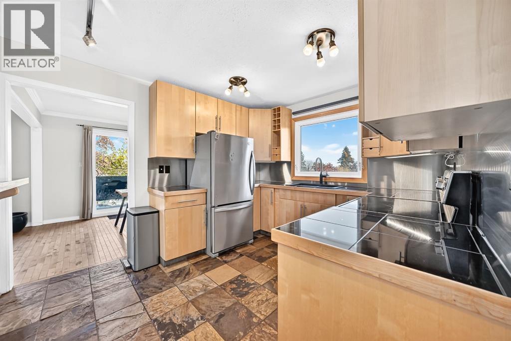 1005 Hunterhaven Road NW, Calgary, Alberta  T2K 4K4 - Photo 10 - A2352262