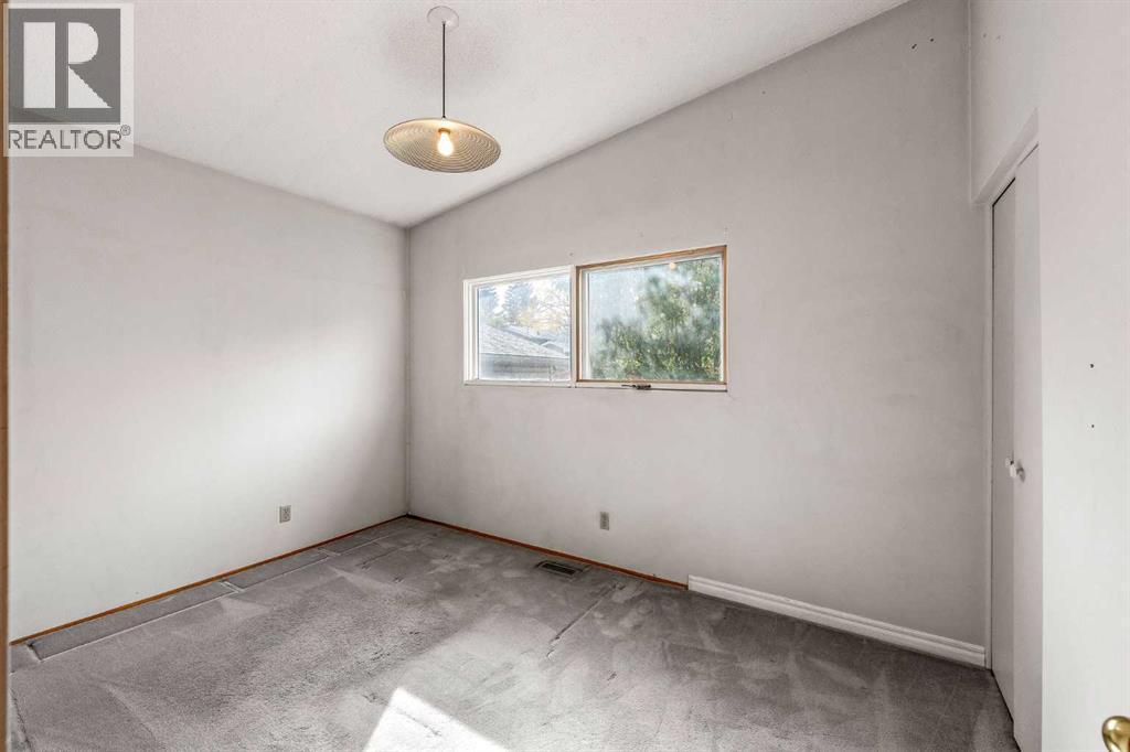 10607 Maplecreek Drive SE, Calgary, Alberta  T2J 1V2 - Photo 22 - A2348433