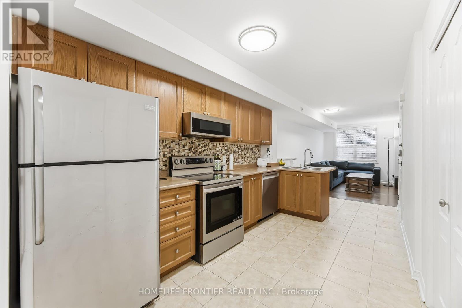 207 - 45 Strangford Lane, Toronto, Ontario  M1L 0E5 - Photo 7 - E14034400