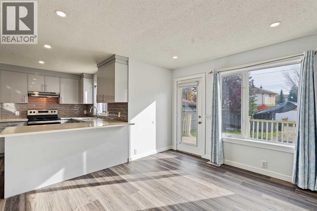 244 Harvest Gold Circle NE, Calgary, Alberta  T3K 4H5 - Photo 9 - A2351746