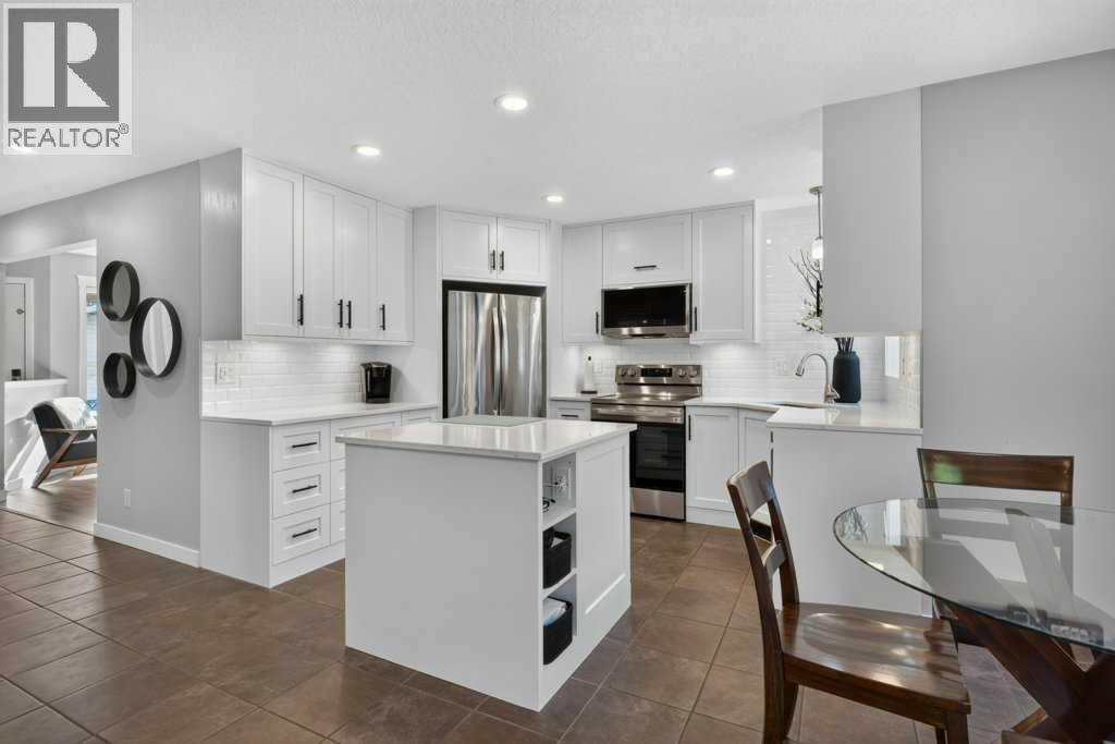 218 Harvest Creek Close NE, Calgary, Alberta  T3K 4P8 - Photo 9 - A2351155