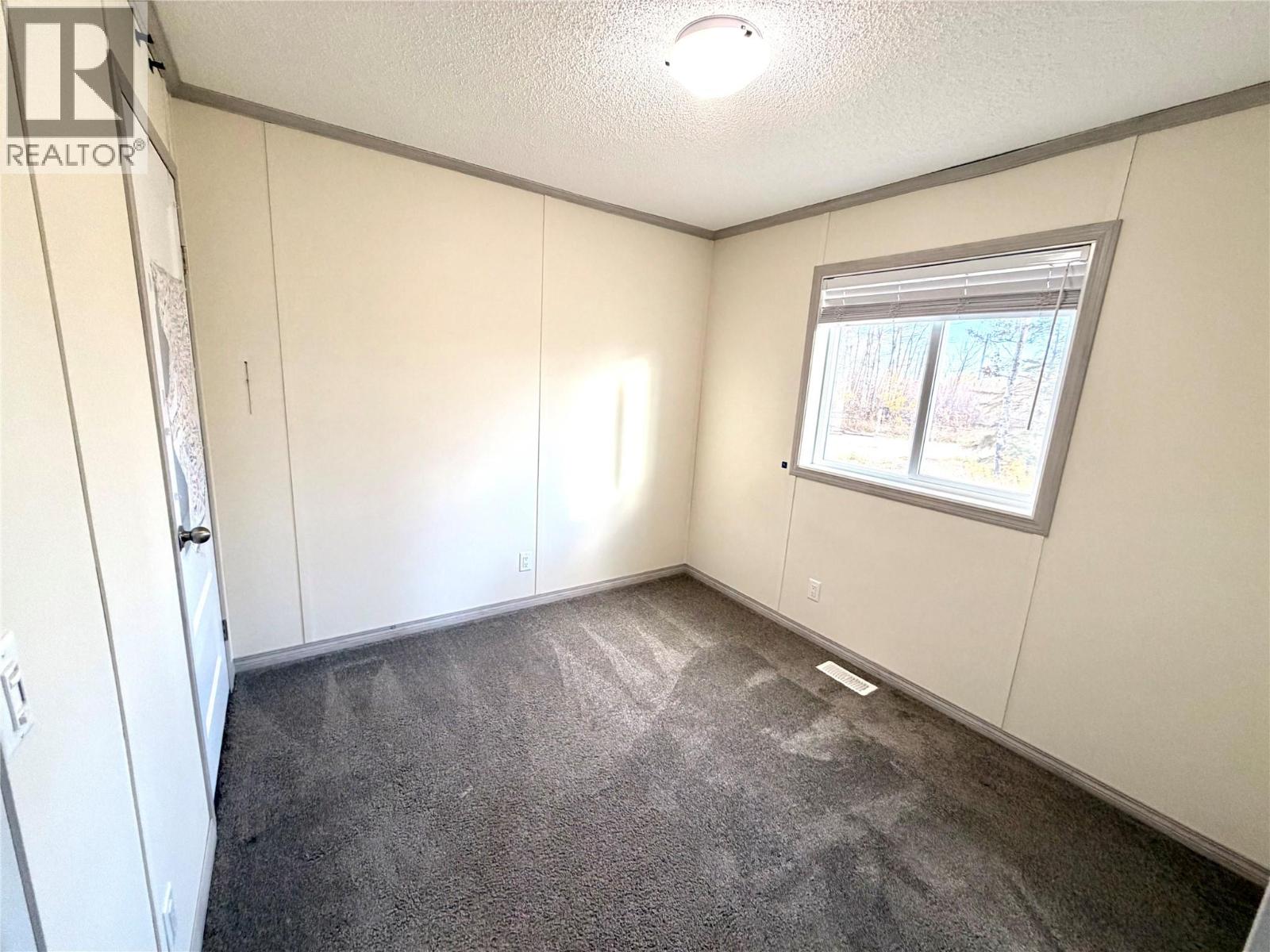 5592 97 Highway N, Dawson Creek, British Columbia  V1G 0J3 - Photo 4 - 10402978