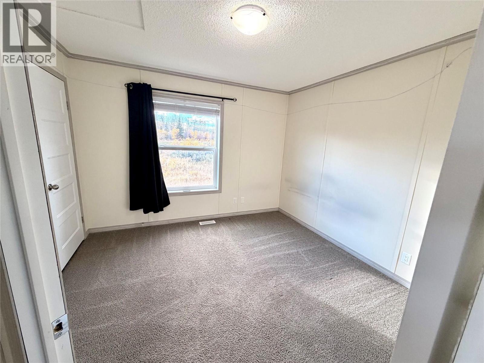 5592 97 Highway N, Dawson Creek, British Columbia  V1G 0J3 - Photo 3 - 10402978