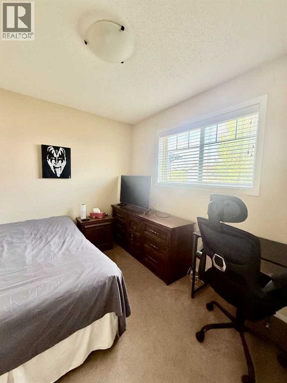 13 Tuscany Ridge Mews NW, Calgary, Alberta  T3L 3B7 - Photo 19 - A2351631