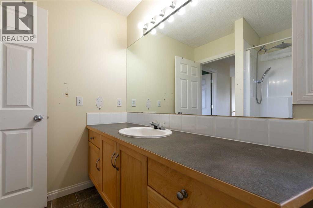 151 Bow Ridge Crescent, Cochrane, Alberta  T4C 1V2 - Photo 25 - A2351846