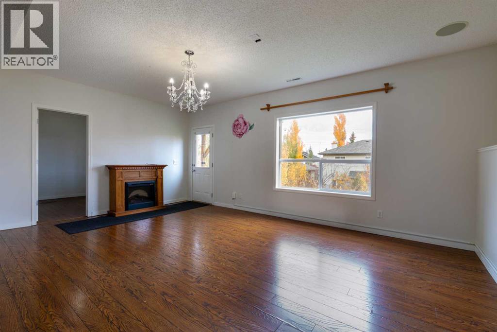 151 Bow Ridge Crescent, Cochrane, Alberta  T4C 1V2 - Photo 27 - A2351846
