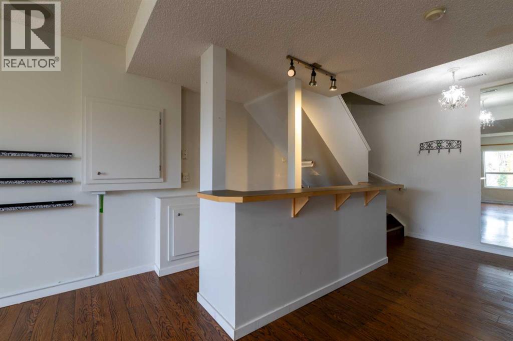 151 Bow Ridge Crescent, Cochrane, Alberta  T4C 1V2 - Photo 28 - A2351846