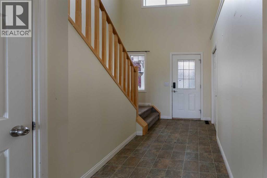 151 Bow Ridge Crescent, Cochrane, Alberta  T4C 1V2 - Photo 5 - A2351846