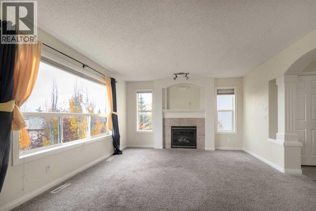 151 Bow Ridge Crescent, Cochrane, Alberta  T4C 1V2 - Photo 6 - A2351846