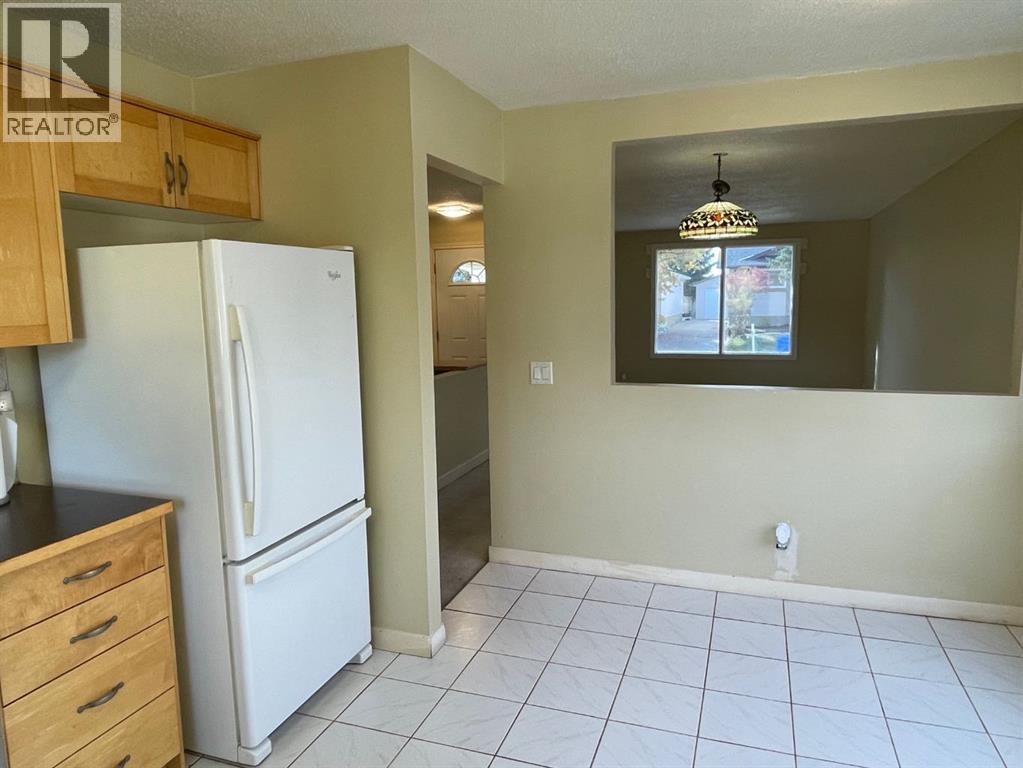 247 Bracewood Road SW, Calgary, Alberta  T2W 3C2 - Photo 9 - A2346722