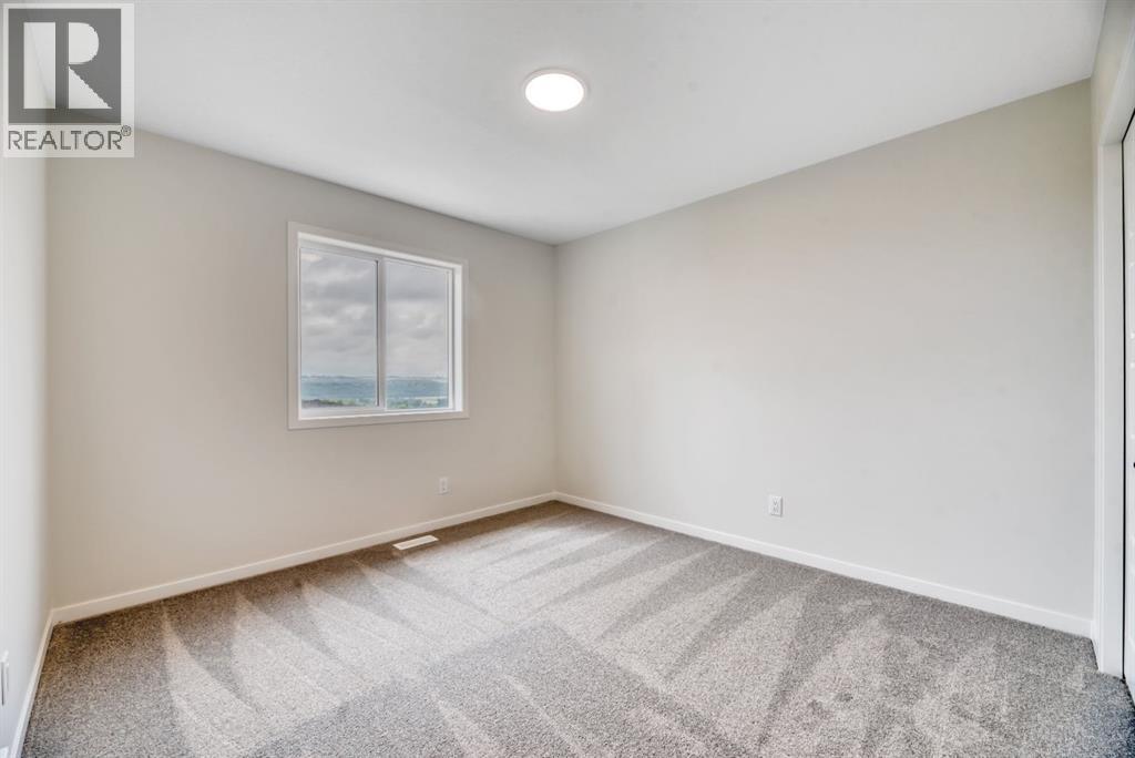 63 Setonvista Grove Se, Calgary, Alberta T3M 4H9 - Photo 29 - A2338674