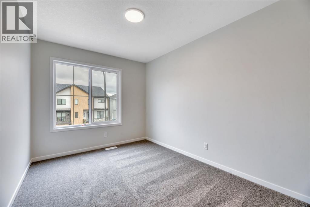 63 Setonvista Grove Se, Calgary, Alberta T3M 4H9 - Photo 32 - A2338674