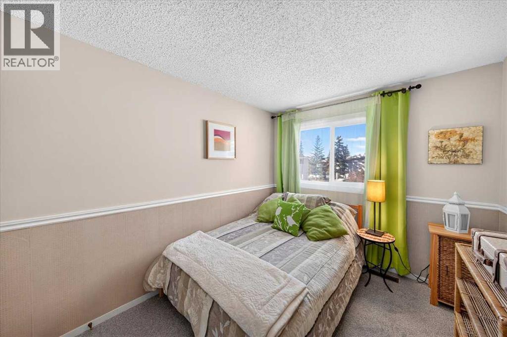 130 Woodmont Terrace SW, Calgary, Alberta  T2W 4Z4 - Photo 26 - A2351852