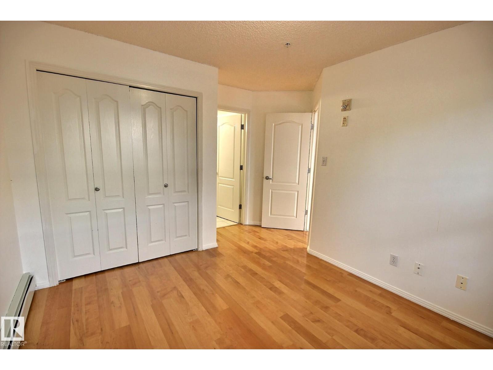 #218 12838 65 ST NW