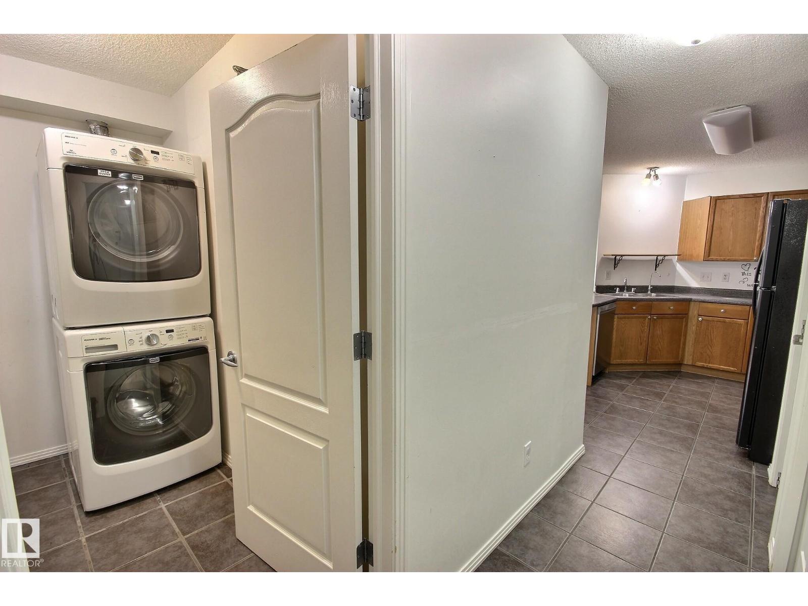 #218 12838 65 ST NW